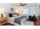 Spacious bedroom with king-size bed, and en-suite bathroom access at 4754 Hedgemore Dr # S, Charlotte, NC 28209