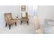 Home office featuring two armchairs and a work desk at 4754 Hedgemore Dr # S, Charlotte, NC 28209