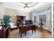 A bright office featuring hardwood floors, a tray ceiling, and a bay window offering plenty of natural light at 1038 Rolling Park Ln, Fort Mill, SC 29715