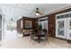 Relaxing screened porch with patio furniture and ceiling fan at 1038 Rolling Park Ln, Fort Mill, SC 29715