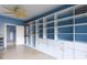 Spacious walk-in closet with custom white shelving and drawers, and a door leading to another room at 1038 Rolling Park Ln, Fort Mill, SC 29715