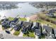 Aerial view of single Gathering home situated in a lakeside community at 112 Sisters Cove Ct, Mooresville, NC 28117