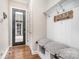 Mudroom with a seating bench, storage cubbies and a coat rack at 112 Sisters Cove Ct, Mooresville, NC 28117