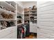 Walk-in closet with ample hanging and shelf space for clothes and accessories at 112 Sisters Cove Ct, Mooresville, NC 28117