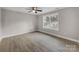 Well-lit bedroom with hardwood floors and a large window at 1308 Carmel Rd, Lancaster, SC 29720