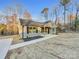 Newly built home with gray siding and a front porch at 1308 Carmel Rd, Lancaster, SC 29720