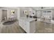 Open concept kitchen and dining area with a center island and modern decor at 1308 Carmel Rd, Lancaster, SC 29720