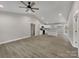 Living room and kitchen with hardwood floors at 1308 Carmel Rd, Lancaster, SC 29720