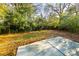 Backyard with a grassy area and a concrete patio at 267 Elm Nw Ave, Concord, NC 28025