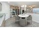 Modern kitchen with stainless steel appliances and breakfast table at 267 Elm Nw Ave, Concord, NC 28025