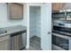 Walk-in pantry with ample shelving for storage at 267 Elm Nw Ave, Concord, NC 28025