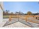 A wooden deck with a view of the front yard and neighborhood at 287 Young Sw Ave, Concord, NC 28025