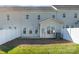 Townhome backyard featuring a freshly sodded lawn, patio, and privacy fence at 833 River Park Rd, Belmont, NC 28012