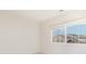 Bedroom with carpet flooring and a large window with views of trees at 833 River Park Rd, Belmont, NC 28012