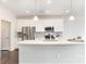 Modern kitchen with white cabinets and quartz countertops at 833 River Park Rd, Belmont, NC 28012