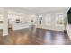 Bright, open-concept living room featuring hardwood floors and natural light at 833 River Park Rd, Belmont, NC 28012