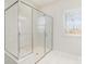 Large walk-in shower with glass enclosure and marble tile at 833 River Park Rd, Belmont, NC 28012