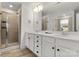 Double vanity bathroom with walk-in shower and bathtub at 12502 Stonebriar Ridge Dr, Davidson, NC 28036