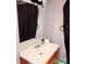 Simple bathroom featuring a sink and mirror at 2040 Ne 25Th Street Dr, Hickory, NC 28601