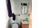 Modest bathroom with a standard vanity, sink, and mirror, ready for your personal touch and updates at 2040 Ne 25Th Street Dr, Hickory, NC 28601
