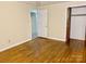 Bedroom with hardwood floors, neutral colors, and closet at 2040 Ne 25Th Street Dr, Hickory, NC 28601