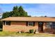 Well-maintained exterior with brick facade, manicured lawn, and inviting front door at 2040 Ne 25Th Street Dr, Hickory, NC 28601