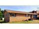 Charming single-story brick home showcasing mature landscaping and a classic roofline at 2040 Ne 25Th Street Dr, Hickory, NC 28601
