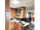 Open concept kitchen with wooden cabinetry and breakfast bar at 2040 Ne 25Th Street Dr, Hickory, NC 28601