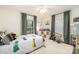 Playful bedroom featuring a car-themed bed, ample natural light, and fun decor, perfect for a imagination at 5431 Park Rd, Charlotte, NC 28209