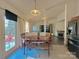 Cozy dining area featuring natural light and an open floor plan, with views to living room at 8430 Stoneman Pl, Charlotte, NC 28217