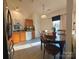 Eat-in kitchen featuring updated appliances, neutral countertops, and natural light at 8430 Stoneman Pl, Charlotte, NC 28217