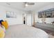 Light-filled primary bedroom with large windows, dresser and a cozy, relaxing atmosphere at 2409 Fathom Way, Charlotte, NC 28269