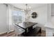 Stylish dining area featuring a modern chandelier, a wooden table with bright natural light at 2409 Fathom Way, Charlotte, NC 28269