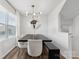 Elegant dining room with modern chandelier and bright natural light at 2409 Fathom Way, Charlotte, NC 28269