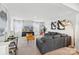 An open concept living room with modern furniture and decor, with lots of natural light at 2409 Fathom Way, Charlotte, NC 28269
