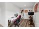 A home office with exercise equipment, a desk, and shelving at 2409 Fathom Way, Charlotte, NC 28269