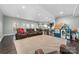 Finished basement with play area, sectional sofa and projection screen at 404 Yorkfield Dr, Shelby, NC 28150