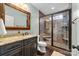 Basement bathroom with granite vanity and a large walk-in shower at 404 Yorkfield Dr, Shelby, NC 28150