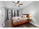 Basement bedroom with a double bed and window with curtains at 404 Yorkfield Dr, Shelby, NC 28150
