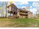 Back of house showing a large deck and screened porch at 404 Yorkfield Dr, Shelby, NC 28150