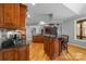 Spacious kitchen boasts a large island, stainless steel appliances, and hardwood floors at 404 Yorkfield Dr, Shelby, NC 28150