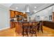 Gourmet kitchen with large island, granite countertops, and wood cabinetry at 404 Yorkfield Dr, Shelby, NC 28150