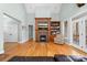 Inviting living area with a fireplace, shelving, and access to the outside at 404 Yorkfield Dr, Shelby, NC 28150