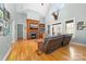 Spacious living room with a cozy fireplace and a custom built-in entertainment center at 404 Yorkfield Dr, Shelby, NC 28150