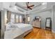 Main bedroom with hardwood floors and a large window at 404 Yorkfield Dr, Shelby, NC 28150
