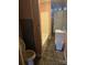 A bathroom with a toilet, sink, tub and peach colored walls presents renovation potential at 50 Ranlo Ave, Gastonia, NC 28054