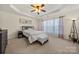 Spacious bedroom with carpeted floor and large window at 11131 Cypress View Dr, Charlotte, NC 28262