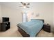 Bright bedroom with a ceiling fan and double windows at 11131 Cypress View Dr, Charlotte, NC 28262