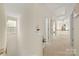 Upstairs hallway with neutral walls and carpet at 11131 Cypress View Dr, Charlotte, NC 28262