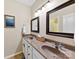 Bright bathroom with double vanity and large mirrors at 1246 Gold Rush Ct, Fort Mill, SC 29708